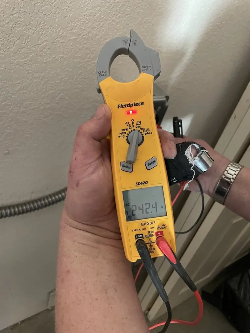 Voltage testing with clamp meter during Hot Tub / Pool Electrical Wiring in South Boston